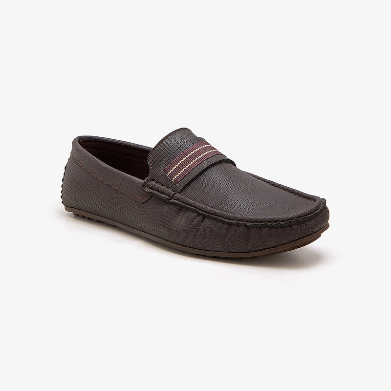 Brown loafer style shoes by calza