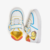 White children's sneakers with colorful accents by calza